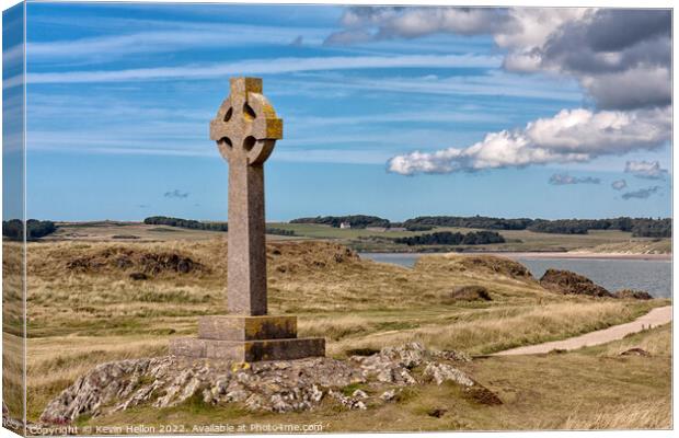 Celtic cross, Llandwyn Island Canvas Print by Kevin Hellon