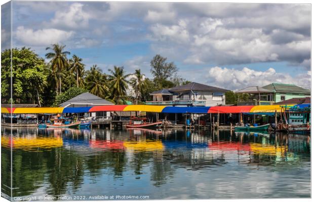 Typical Thai fishing village Canvas Print by Kevin Hellon