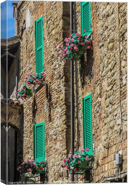 Colourful shutters on a house in Bevagna, Umbria, Italy Canvas Print by Kevin Hellon