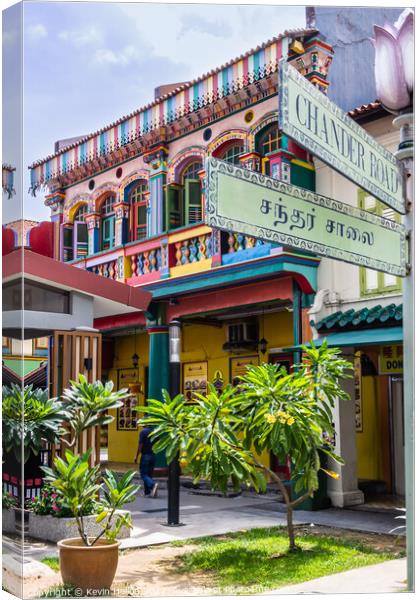 Colourful building in Little India, Singapore Canvas Print by Kevin Hellon