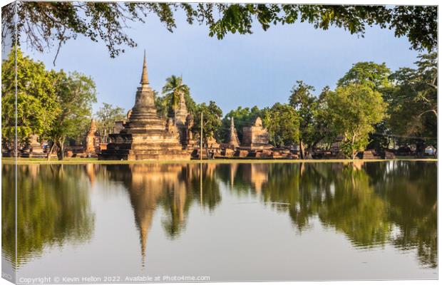 Reflections in the lake of Ayutthaya Historical Park Canvas Print by Kevin Hellon