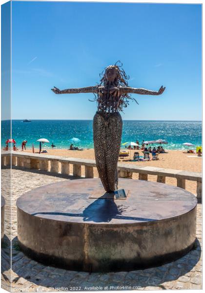 Mermaid statue, Albufeira Canvas Print by Kevin Hellon