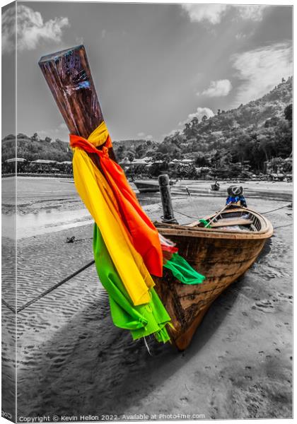 Long tail boat with colourful prow ribbons on Nai Yang Beach, Ph Canvas Print by Kevin Hellon