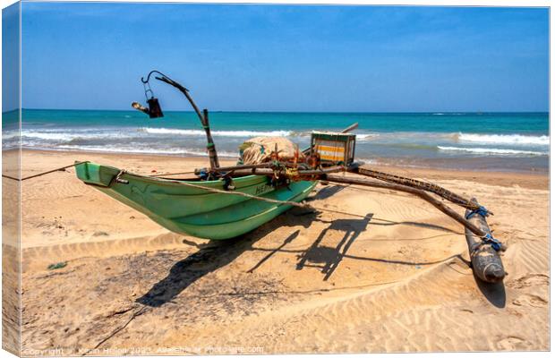 Traditional, Sri Lankan fishing boat, beach, Colombo, Sri Lanka Canvas Print by Kevin Hellon