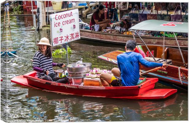 Cocnut ice cream boat vendor, Damnoen Saduak floating market, Th Canvas Print by Kevin Hellon