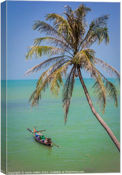 Cocnut palm and long tail boat Canvas Print by Kevin Hellon