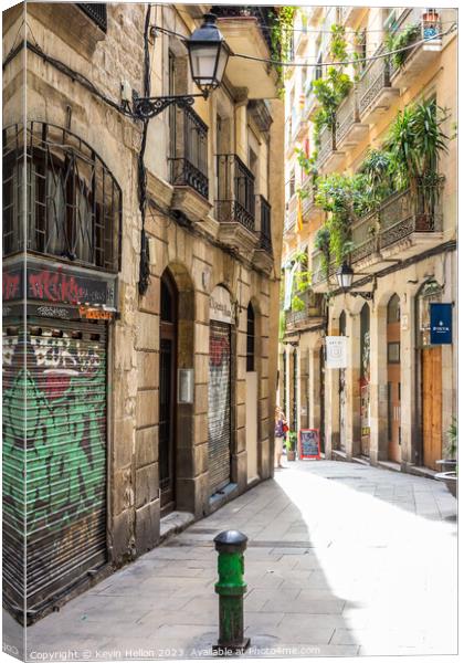 Typical narrow street in the Gothic quarter of Barcelona, Spain Canvas Print by Kevin Hellon