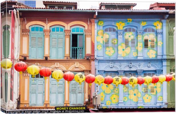 Colourful Chinese shophouses and lanterns in Pagoda street, Chin Canvas Print by Kevin Hellon