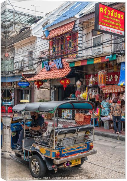 Tuk tuk in a street in Chinatown. Canvas Print by Kevin Hellon