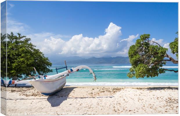 Jukung outrigger boat Canvas Print by Kevin Hellon