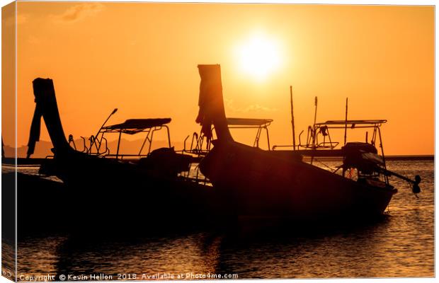 Silhouettes of long tail fishing boats, Pak Meng,  Canvas Print by Kevin Hellon