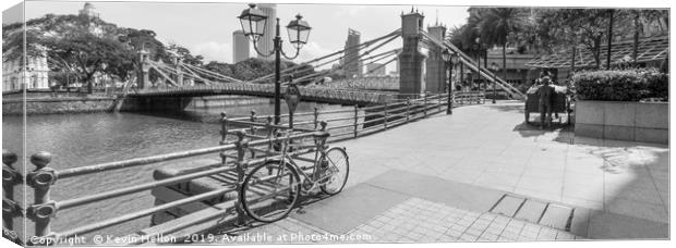 Bicycle leaning against railings with Cavenagh Bri Canvas Print by Kevin Hellon
