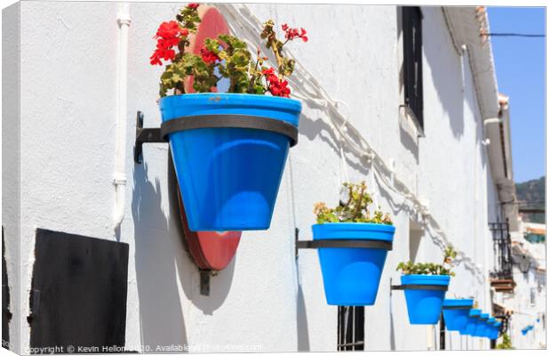 Blue plantpots against whitewashed walls Canvas Print by Kevin Hellon