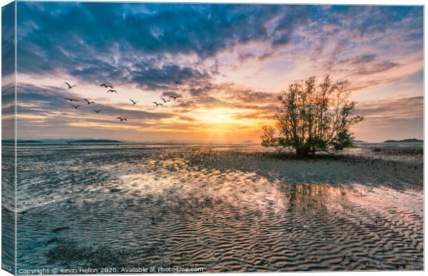 Dawn over the mudflats Canvas Print by Kevin Hellon