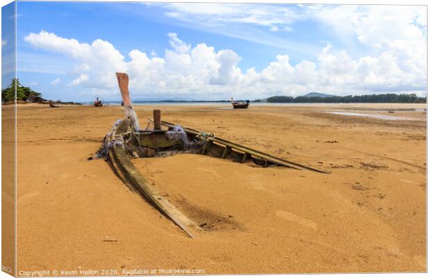 Old boat buried in the sand Canvas Print by Kevin Hellon