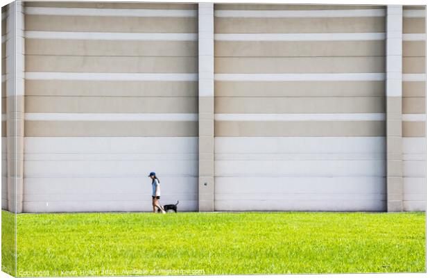 Girl walking dog Canvas Print by Kevin Hellon