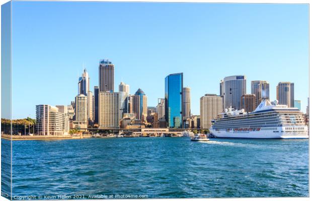 A cruise ship docked in SYdney Harbor. Canvas Print by Kevin Hellon