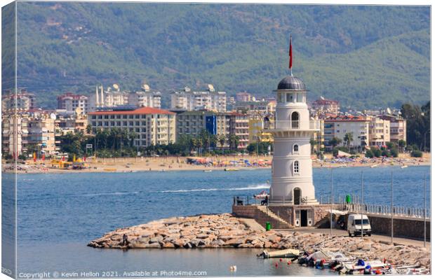 The lighthouse guarding the entrance to Alanya harbour Canvas Print by Kevin Hellon