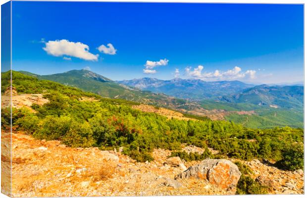 View of the Taurus or Toros mountains, Turkey Canvas Print by Kevin Hellon