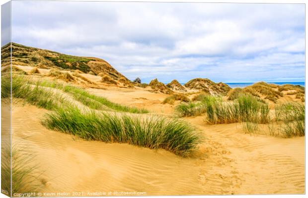 Grassy sand dunes Canvas Print by Kevin Hellon