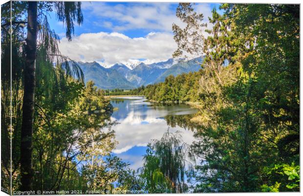 View over Lake Matheson with Mount Cook in the bac Canvas Print by Kevin Hellon