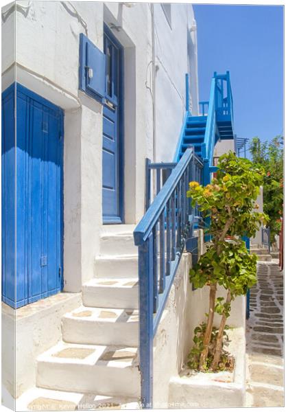 Blue and white house in Mykonos  Canvas Print by Kevin Hellon