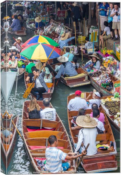 Tourists in boats Canvas Print by Kevin Hellon