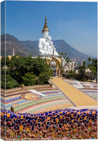 Five white Buddha statues Canvas Print by Kevin Hellon