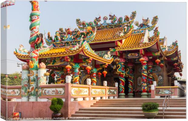 Chinese temple in the centre of the town.  Canvas Print by Kevin Hellon