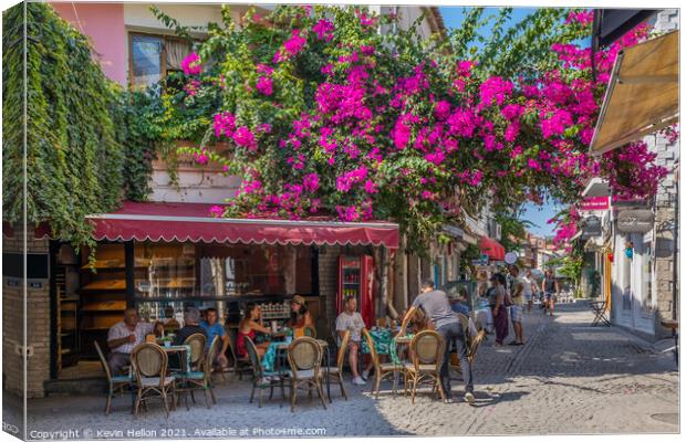 People eating in a cafe Canvas Print by Kevin Hellon