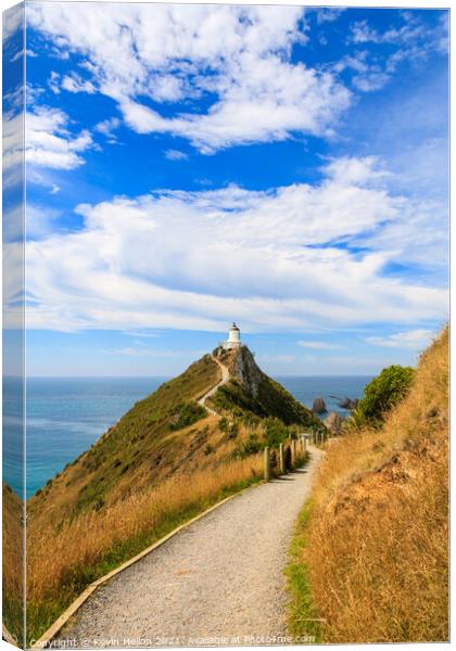 Pathway leading up to the lighthouse Canvas Print by Kevin Hellon