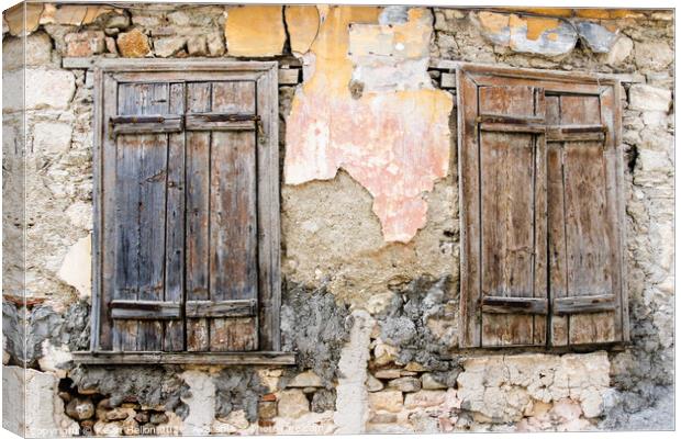 Old wooden window shutters Canvas Print by Kevin Hellon