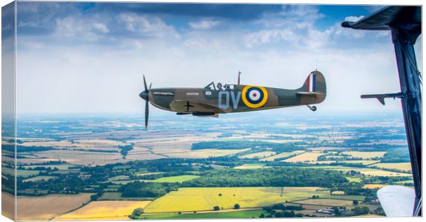 A Spitfire on the Wingtip Canvas Print by Mike Lanning