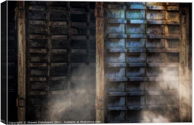 Natural light and dust flies through the air at a concrete factory Canvas Print by Steven Dijkshoorn