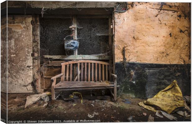 A lonely chair in an abandoned room Canvas Print by Steven Dijkshoorn