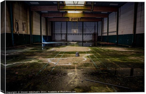 An old and abandoned basketball court Canvas Print by Steven Dijkshoorn