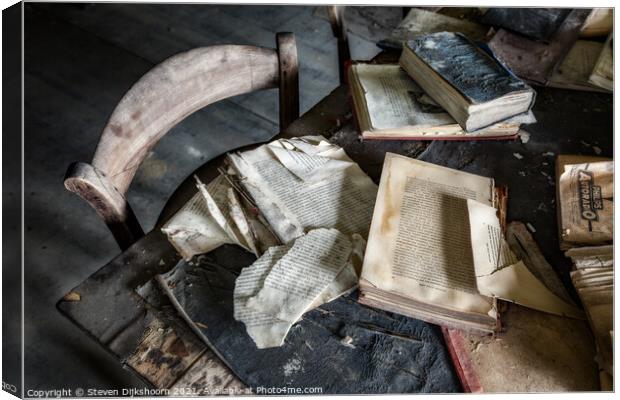 A table with old books on it Canvas Print by Steven Dijkshoorn