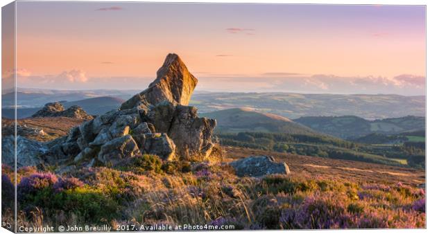 Stiperstones at sunset Canvas Print by John Breuilly