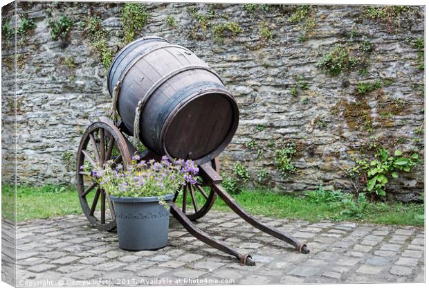 old wine barrel with wheels  Canvas Print by Chris Willemsen