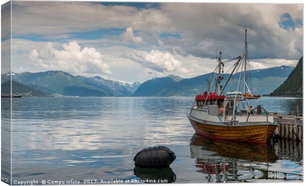 fishing boat in the harbor of Vik Canvas Print by Chris Willemsen