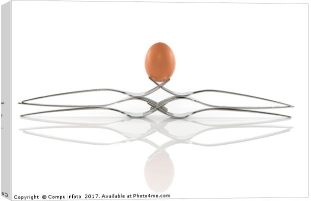 egg balance on six forks Canvas Print by Chris Willemsen