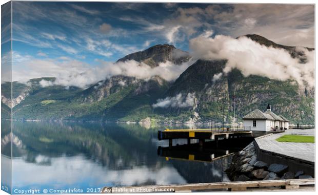 mountains and clouds above the eidfjord in norway Canvas Print by Chris Willemsen