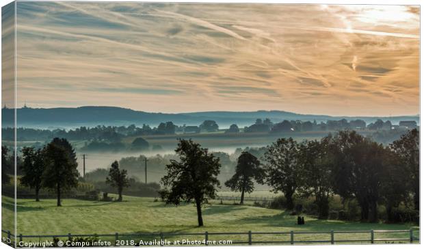 sunrise in the hills of belgium with mist Canvas Print by Chris Willemsen