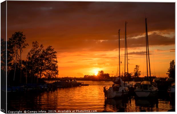 sunset in the harbor of de veenhoop in holland Canvas Print by Chris Willemsen