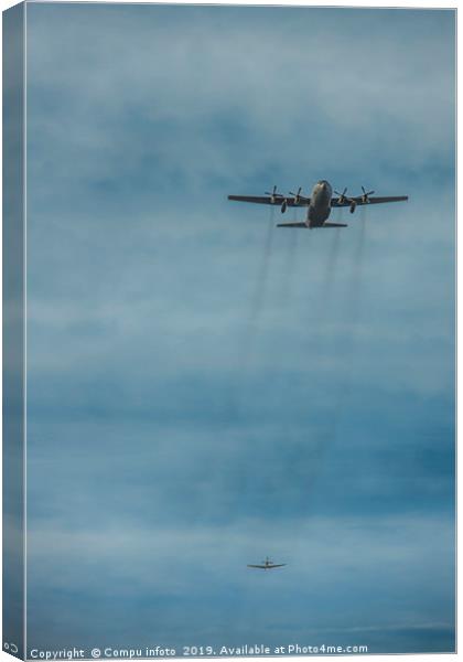 two hercules aiplanes ready for para drops Canvas Print by Chris Willemsen