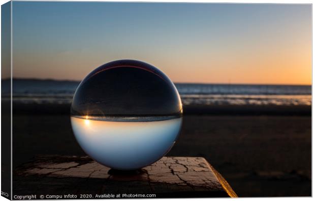 sunset on the beach captured in glass crystal sphe Canvas Print by Chris Willemsen