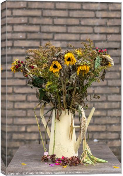 bouquet of dry flowers in yellow watering can Canvas Print by Chris Willemsen