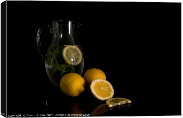 water jug with mint and lemon Canvas Print by Chris Willemsen