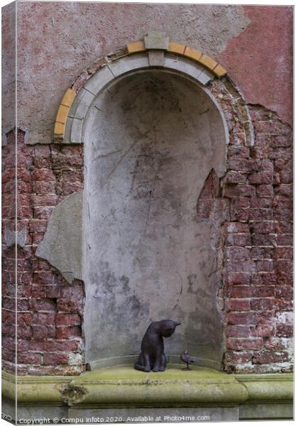 old wall wth cat and bird Canvas Print by Chris Willemsen