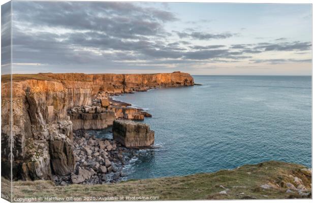 Stunning vibrant landscape image of cliffs around St Govan's Head on Pembrokeshire Coast in Wales Canvas Print by Matthew Gibson